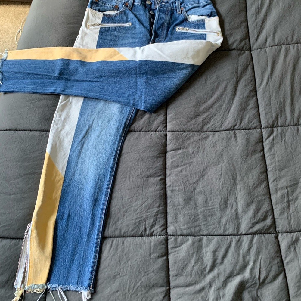 Levi’s 501 skinny jean, zipper bottoms, white and yellow panels, button fly